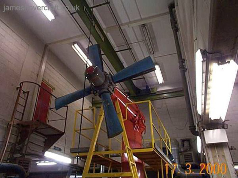 SRN4 systems tour - A pylon fitted with a trimmed propeller, following a new paint job and testing while in the engineering department of Hoverspeed. Note the complex nut in the centre of the propeller, attaching it to the main prop shaft; this nut provided the variable pitch capabilities of the craft, that is to say, forward, zero, and reverse pitch. Zero pitch was used for stationary hovering, reverse pitch for manoeuvring or slowing down, and the varying degrees of forward pitch could be used to vary speed. (submitted by James Rowson).